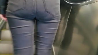 Girl's ass in tight jeans