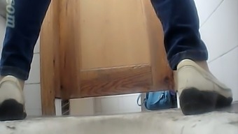 Blonde sexy girl in blue jeans filmed on hidden voyeur cam