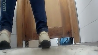Blonde sexy girl in blue jeans filmed on hidden voyeur cam