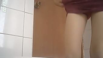 Cute white lady in maroon dress and green panties in the toilet room