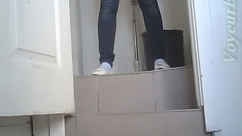 White chick in black jeans and white blouse pissing
