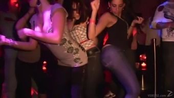 Amateur party chics dance skin to skin while drunk in the club