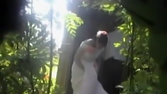 Bride and groom caught peeing