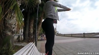 franceska jaimes in a leggings posing on the bench in public