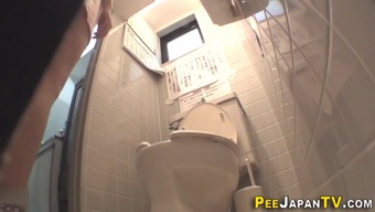 Asian teen pees on camer