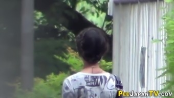 Japanese babe watched pee
