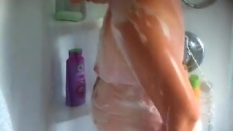 Soapy wet wife in shower