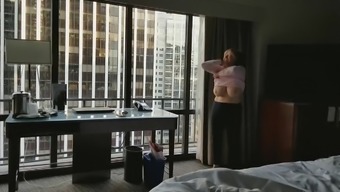Mature hottie naked in hotel window