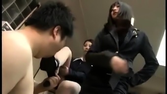 Two elegant Japanese ladies punish a kinky guy in the office