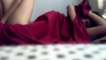 Pretty Indian teen has sex with her boyfriend on hidden cam