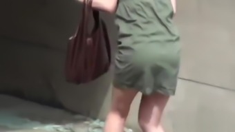 Asian babe caught pissing