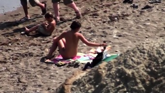 Public outdoor sex on the beach by private couple