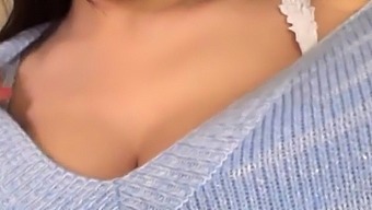 Japanese cutie gets her large tits and juicy cunt played