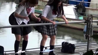 Asian teens squat and pee
