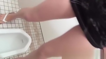 Japanese babes peeing golden piss in urinal POV voyeur