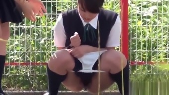 Teen students pee outside