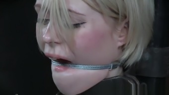 Submissive beauty gagged by maledom master