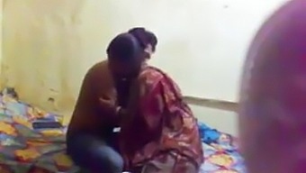 Indian Aunty Played with Young Boy      