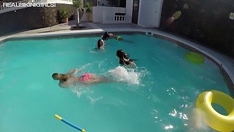 Topless bikini girlfriends are having fun in the pool