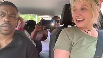 A hot white chick is happy AF to serve two big black cocks