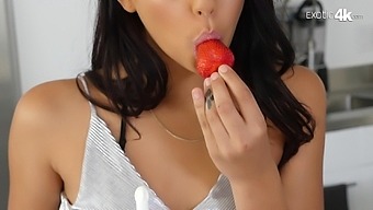 Sweet tooth Gina Valentina enjoys eating strawberries with a big hard cock
