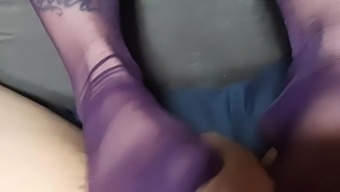 Milf gives footjob sockjob in nylon stockings