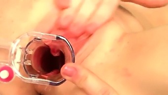 Lovable teenie is opening up spread vagina in close range an