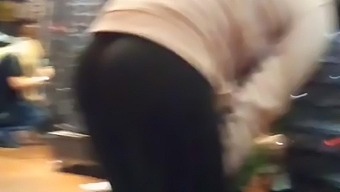 Candid perfect ass in leggings bending over close up