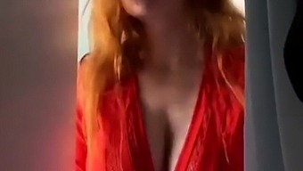 Provoking amateur redhead flaunts her big boobs on webcam