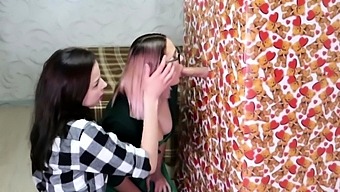 Two naughty teens work their luscious lips on a mystery cock
