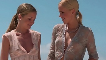 Blonde bombshells Yasmine and Marietta indulge in sensual oral pleasure
