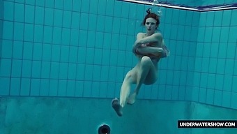 Hot teen Lera with big boobs swims in the pool