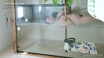 Voyeuristic view of a hidden Chinese bathroom camera