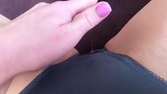 Lilu Wet Twat is massaging close up denuded vag in provocative panties to view her getting damp.