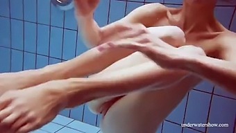 Big natural tits of Italian beauty Martina in public pool