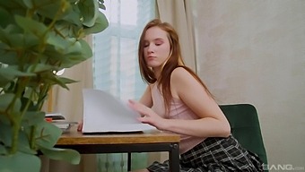 Redhead teen spreads her legs and plays with herself in HD video