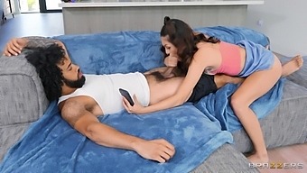 Black man with curly hair and big cock fucks stunning brunette on sofa in stunning home scenes